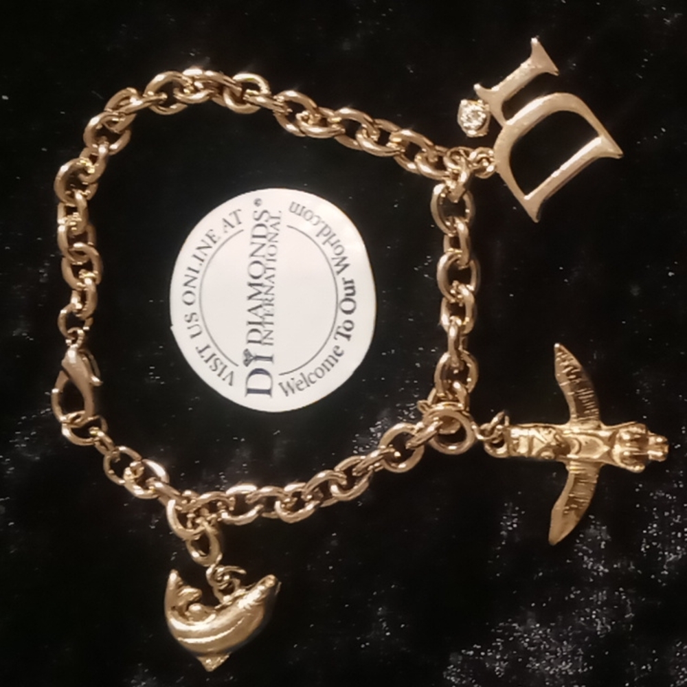 Men's vintage new old stock. Diamond International. Totem pole and fish bracelet